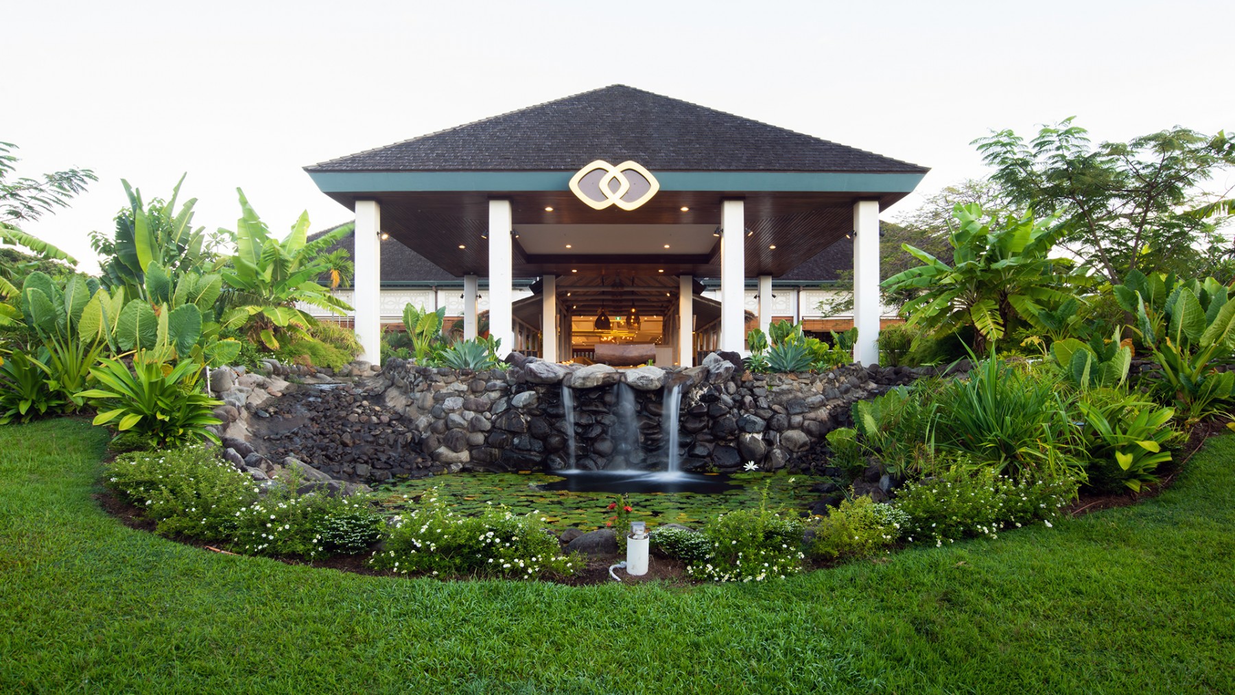 Main entrance porte-cochere of Sofitel Fiji Resort & Spa with waterfall garden