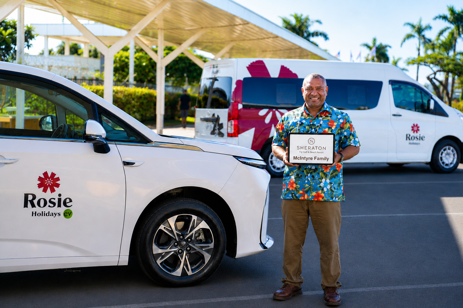 Rosie Holidays driver with Sheraton meet & greet sign at Nadi Airport